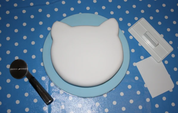 How to make a hello Kitty Birthday cake from a square cake. Madiera works best