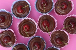 Indulgent chocolate cupcakes adorned with sprinkles"