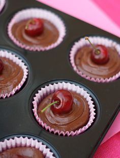 Decadent chocolate cupcakes topped with creamy frosting