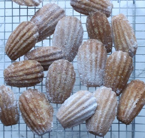 Madeline cakes with lightly sifted icing sugar ready to devour