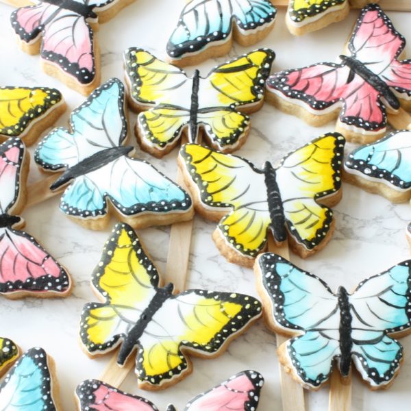 Painted butterfly cookies on sticks 