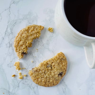 Boozy, Gooey, Raisin, Choc-chip, Oat Cookies on a plate