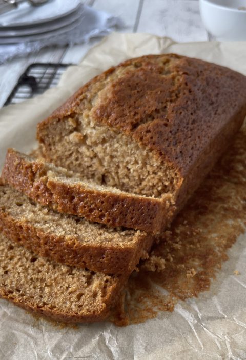 Freshly baked honey cake loaf with a golden brown top